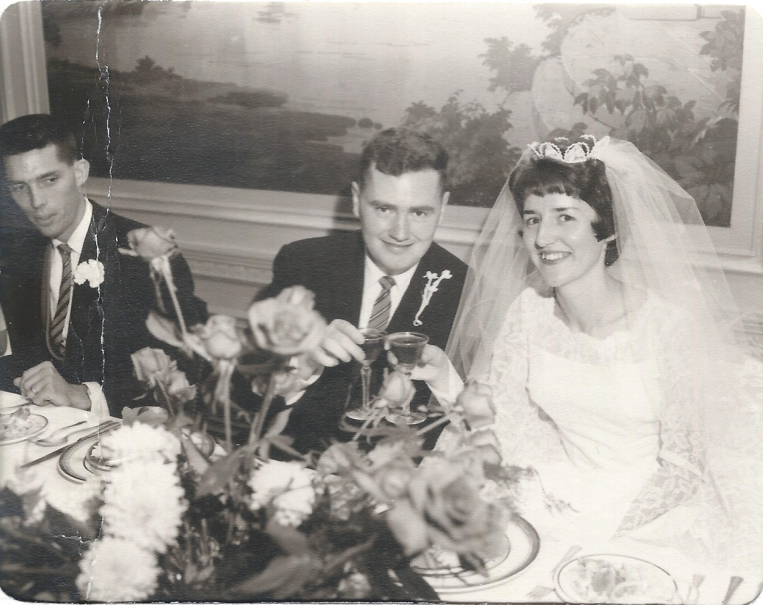 Black and white wedding photo, bride and groom.